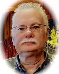 Michael J. Wooley (1955-2019)