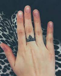 A crown tattoo is a cute way to show off one's queen status. 45 Crown Finger Tattoos Ideas
