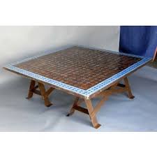 Traditional oriental seating area is different from the european one — a small, wooden podium should replace sofa. Moroccan Coffee Table You Ll Love In 2021 Visualhunt