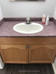 Now the vanity is free to be lifted and removed from the base cabinet. Easy No Fuss Diy Bathroom Remodel The Bewitchin Kitchen