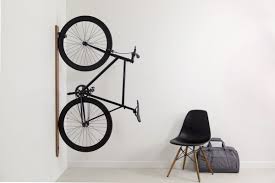 Bicycle of joy wall art klapit design your walls. Wall Mounted Bike Racks That Look Great While Being Practical