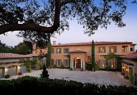 Perfect for entertaining and everyday living, the kitchen and dining room combination boasts stylish tile flooring, stainless steel appliances, glass tile backsplash, and a sliding glass door to the backyard. The Romantic Villa Of Author Rhonda Byrne The Secret Christie S International Real Estate