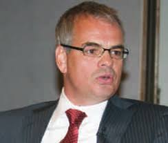 AMID COMMERCE AND CULTURE