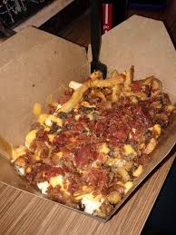 A dish consisting of french fries and fresh cheese curds topped with hot gravy. Traditional Poutine Recipe Poutine Is A Canadian Comfort Food Invented In Quebec In 1957 And Is Generally Made With Chee Recipes Poutine Recipe Canadian Food