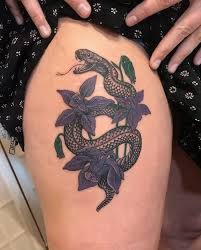 New Ink By My Girl Snake Thigh Tattoo With Flowers Thegigilyn Snaketattoo Alpinecolumbine Tattoosofinstagram New Snake Thigh Tattoo Tattoos Thigh Tattoo