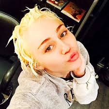 The platinum hair color is just the latest in a long hair transformation for miley. Photos Miley Cyrus Bleached Blonde Hair Miley Cyrus Style People Com