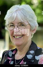 In this photo taken June 16, 2010, Karen Eckert wears a photo of her sister Beverly  Eckert, a victim of the crash of Continental Connection Flight 3407 in Feb.  2009 near Buffalo,