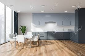 View our collection of quality yet affordable white kitchen worktops. Interior Of Panoramic Kitchen With White Walls Wooden Floor Stock Photo Picture And Royalty Free Image Image 116378871