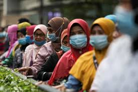 Almost all women wear hijab. Malaysian Women Children Bear Brunt Of Coronavirus Lockdown South China Morning Post