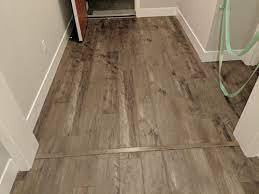 4 tile to carpet transition options for a stunning floor. Laminate Flooring Transition Piece