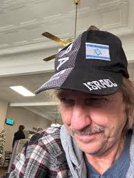 This is what israel looks like today... married people with a gun, ladies  walking