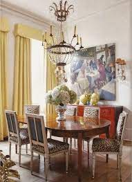 not so feminine crystal chandelier dining room chairs eclectic dining room dining room inspiration