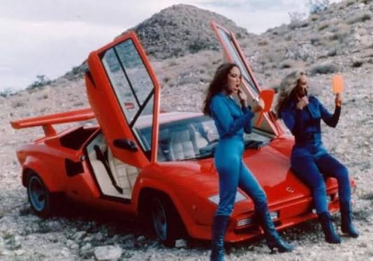 Lamborghini Countach - Cannonball Run II. (1983) Features in the opening  scene with co-stars Catherine Bach and Susan Anton. Famously turns from  white to red. The Countach at the time belonged to