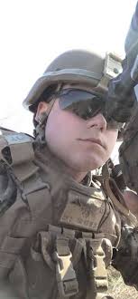 Military grave site with missing man flyover