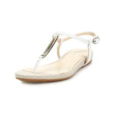 Karl lagerfeld velocota logo strap flatform sandals in black. Calvin Klein Posey Flat Sandals In White Patent White Lyst