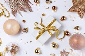Christmas flat lay scene with git box with golden bow Stock Photo | Adobe  Stock