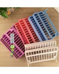 A combination of stainless steel with wooden design.it has different compartment for laddles and more. Buy Plastic Dish Rack Online In Pakistan Ebuy Pk