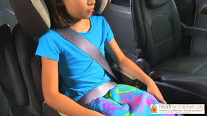 You also want to make sure that the child is the proper height for the seat belt to go across her shoulder and lock in place without going across his face or neck. How To Use A Booster Seat Youtube