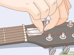 Posisi jari ini harus kamu ingat dengan baik. 4 Cara Untuk Mengeset Gitar Wikihow