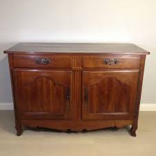 Crafted of manufactured wood in a curado cherry finish, this sideboard showcases chunky moldings, recessed paneling, and carved bracket feet. Solid Cherry Wood Buffet Sideboard Circa 1830 184877 Sellingantiques Co Uk