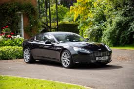 Image result for Onyx Black 2011 Aston Martin