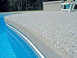 Installing a swimming pool coping on the pool's edge can help keep debris from falling into the pool area. How To Choose The Perfect Pool Cooping Pros And Cons For Material And Finishes Piatraonline Com