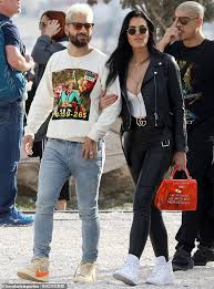 Colombian singer maluma has fallen for natalia barulich maluma burst a few bubbles after paparazzi photos of him cuddling with natalia barulich while on vacation in portofino, italy, went viral last week. Maluma Puts On Romantic Display With Girlfriend Vivien Rubin In Athens After Postponing Milan Show Daily Mail Online