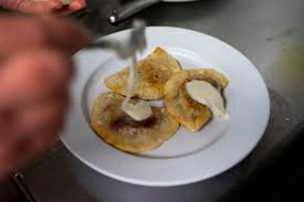 Usually full of jelly or some kind of sweet filling, they are known to draw lines around the block this time of year. Hamtramck S Polish Village Creates Paczki Pierogi For Fat Tuesday