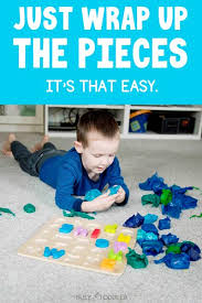 Puzzle Unwrap A Fun Toddler Activity Busy Toddler Toddler Activities Toddler Learning Activities Fun Activities For Toddlers