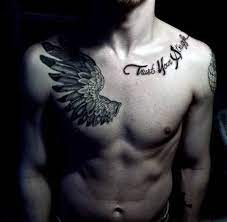 Top 41 Chest Writing Tattoo Ideas 2020 Inspiration Guide In 2020 Collar Bone Tattoo For Men Chest Tattoo Men Cool Shoulder Tattoos