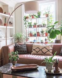 Plant Shelf In Front Of Windows Decor Plant Shelves Shelf Behind Couch Plants are kept a safe distance from cold window glass.