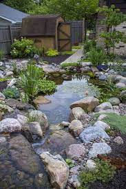 Use waterfall foam to fill in the gaps between rocks. Dazzling Backyard Pond Ideas To Bring Oasis To Your Outdoors Decortrendy Garden Pond Design Ponds Backyard Backyard Water Feature