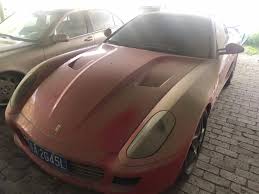 The first ferrari road car was the 125 s which was made in 1947 and featured a 1.5l v12 engine. Chinese Court Puts Dirty Ferrari 599 Up For Auction For 245