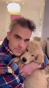 Adorable Puppy Love with Robbie Williams