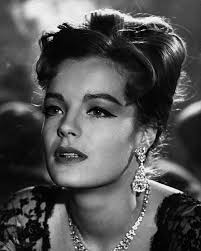 David McCallum Sr teaching actress Romy Schneider some violin for her film  The Victors, 1962.