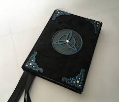 Spell Book Build Your Own Spell Journal Grimoire Book Of Shadows Triquetra Symbol Book Of Shadows Grimoire Book Spell Book This book is an 900 page (450 leaves) available in postbound, meaning the pages can be moved sorry traditional has been discontinued. spell book build your own spell journal