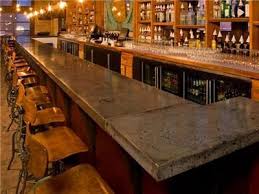 Will concrete stick to foam? Concrete Countertops Solid Concrete Tops Milwaukee Wi Distressed Concrete Look With The Wood Accents Concrete Countertops Concrete Bar Bar Countertops