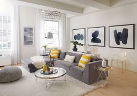 7 Best Winter 2019 Interior Design Trends To Try In Your Home Decorilla Online Interior Design Yellow Decor Living Room Living Room Grey Grey And Yellow Living Room