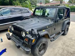 Image result for Brilliant Black 2004 Jeep