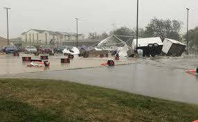 Caution tape is wrapped around a low downed power line that stretches over a roadway, thursday, aug. Severe Storms Tear Across Iowa Leaving More Than 400k Without Power Iowa Public Radio