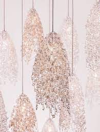 A decorative light that hangs from the ceiling and has several parts like branches for holding…. Collection Porus Studio Modern Contemporary Furniture Unique Chandeliers Lbl Lighting Chandelier