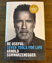 We've got some ARNOLD 💪 swag to give away 😮 If you want a chance to WIN  this personally autographed book 📖 🖊️ just share post and comment “I'll  be back” in