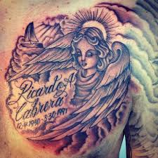 Examples of memorial tattoos to memorialize a family member, dear friend, or a beloved pet. Superb Angel Remembrance Tattoo On Chest