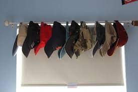 Baseball Cap Valance For Office Finally A Storage Solution For The Dozens Of Caps We Have By Bertha Baseball Caps Storage Cap Storage Hat Storage