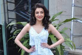Kajal aggarwal in red trouser suit at kavacham trailer launch hi resolution posters. Kajal Aggarwal Turns Cop For Ghosty Cinema Express