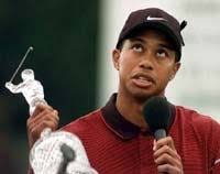 Woods caps tragic week with Tour win