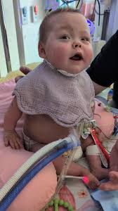 Update: Her Daddy's nervous hands are there to catch her if she falls but  my big girl is learning to catch herself. Every day, she sits up longer  than the day before! She's doing well. Her blood gas ...