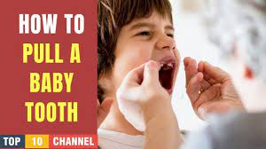 If you are not able to do this, swish water in your mouth and spit it back out a few times. How To Pull A Baby Tooth Out At Home How To Pull A Loose Tooth Baby Teeth Teeth My Baby Care