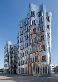 The new zollhof is part of düsseldorf's media harbour, designed by renowned architects such as frank o. Neuer Zollhof Lummel Metal Aesthetics