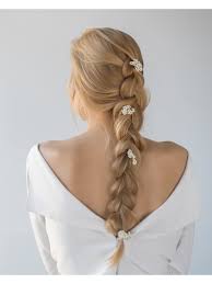 Try this different hairstyle for your long hair on your big day. The Most Beautiful Wedding Hairstyles For Long Hair